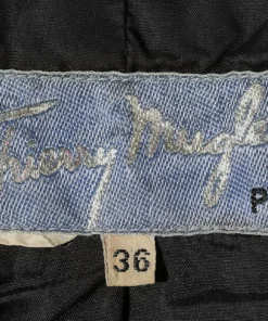 Annie's Archive 1994 Thierry Mugler Wool Black Buckle Jacket And Skirt. Rent: £90/Day 21 Annie's Archive 1994 Thierry Mugler Wool Black Buckle Jacket And Skirt. Rent: £90/Day