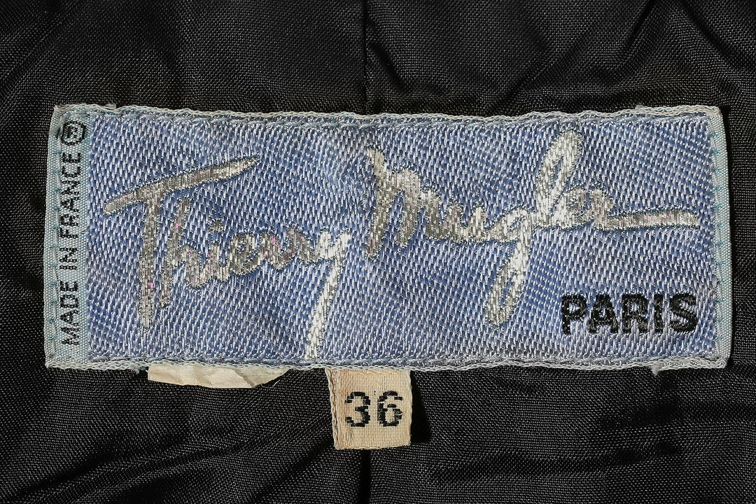 Annie's Archive 1994 Thierry Mugler Wool Black Buckle Jacket And Skirt. Rent: £90/Day 12 Annie's Archive 1994 Thierry Mugler Wool Black Buckle Jacket And Skirt. Rent: £90/Day